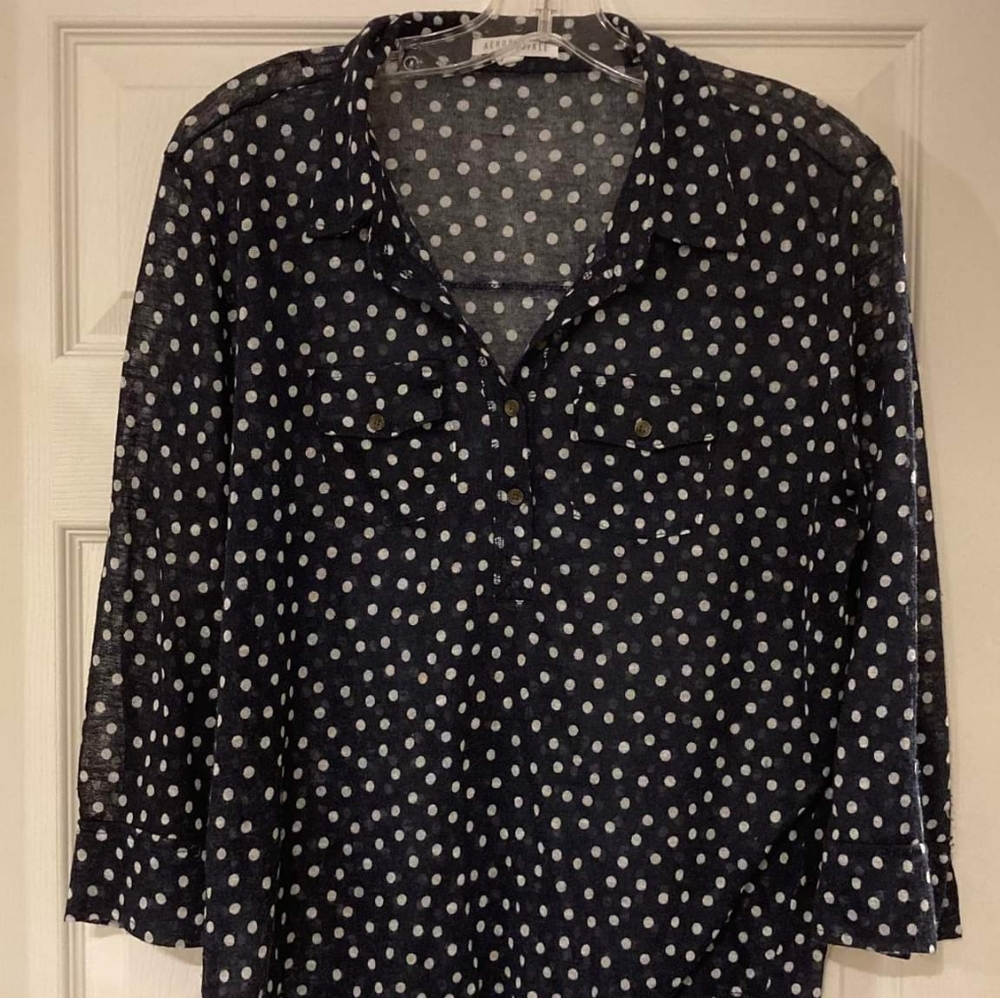 Blue and white polka-dot blouse